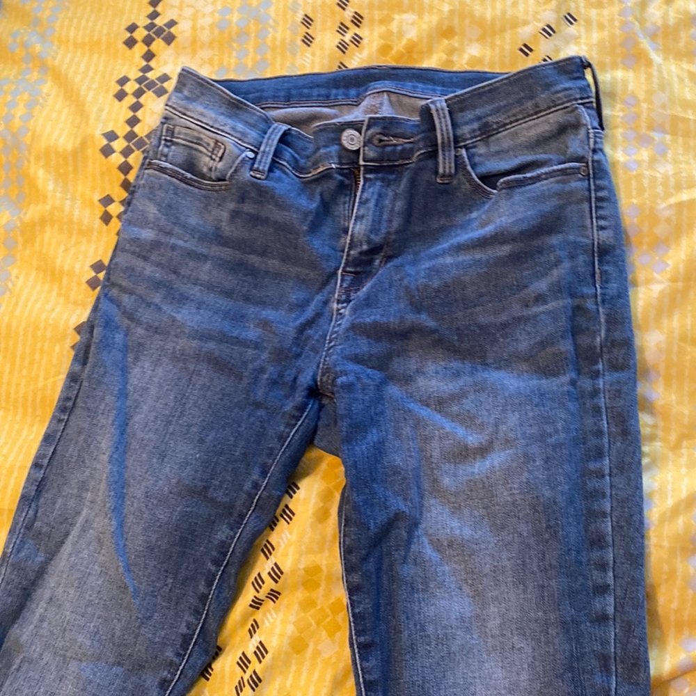 Casual ripped Jeans, has been worn through the years but in great condition.